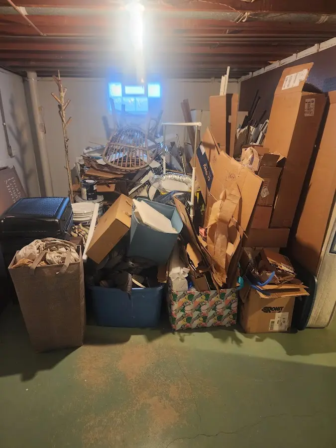 Roll-off dumpster container at job site for 20 Yard Dumpster Rental in Stonington